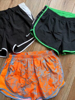 Bundle of 3 ladies running shorts Nike Dri-Fit size medium orange black green
